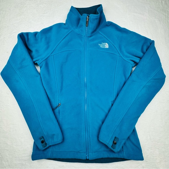 The North Face Tops - The North Face Zip Up Teal Fleece Jacket. Women’s size XS. Side zipper pockets.